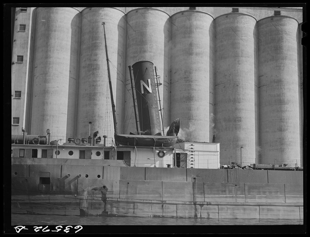 Loading grain boat at Occident elevator. Duluth, Minnesota. Sourced from the Library of Congress.