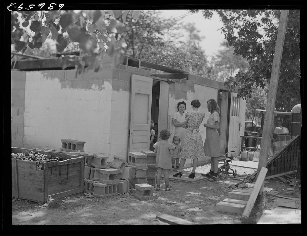 Detroit, Michigan. Ladies toilet in the Daniels trailer park where many defense workers live. Sourced from the Library of…