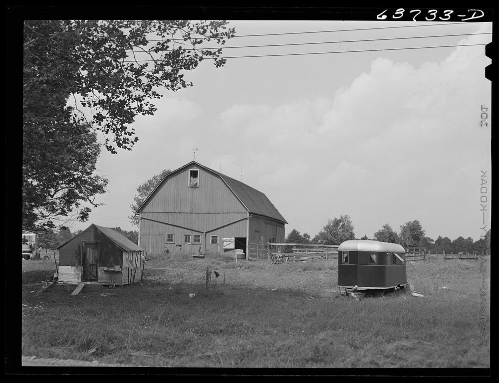 Defense workers' housing in farmyard outside of Ravenna, Ohio, near smokeless powder plant. Sourced from the Library of…