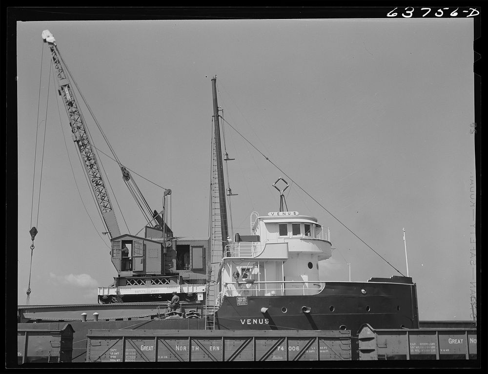 Loading scrap iron on Great Lakes boat. Superior, Wisconsin. Sourced from the Library of Congress.