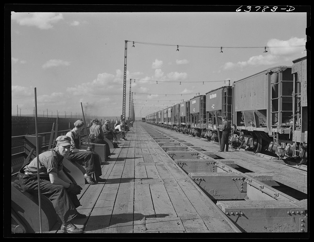 Ore punchers waiting for cars of iron ore to come in. Allouez, Wisconsin. Sourced from the Library of Congress.