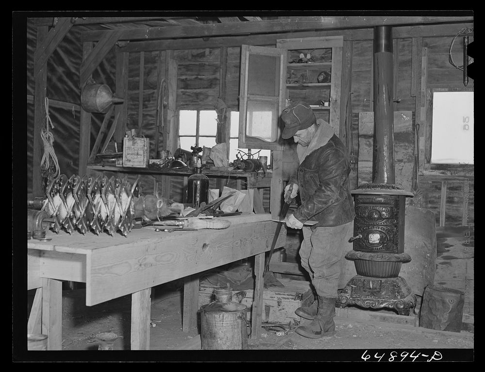 Adams County, North Dakota. Stock farmer George P. Moeller in his machine shed. Sourced from the Library of Congress.