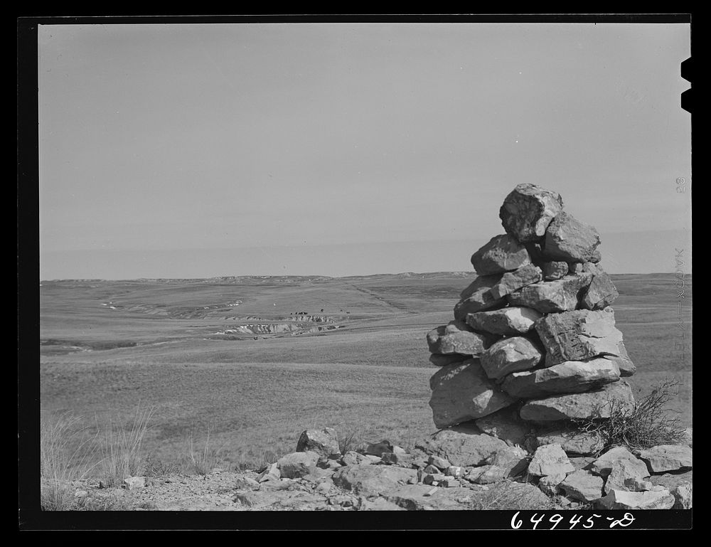 McCone County, Montana. March 1942. Sheepherders' monument on top of a butte. These monuments formerly indicated that there…