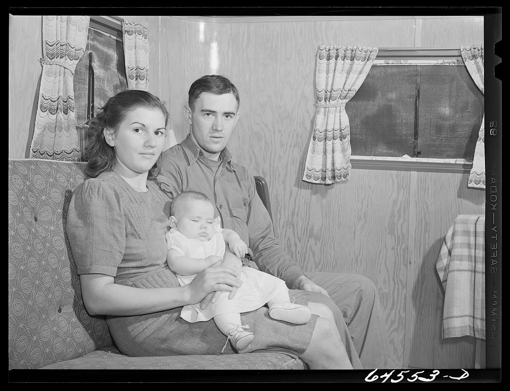 Burlington, Iowa. Sunnyside unit of FSA (Farm Security Administration) camp. Simmons family in their trailer for workers at…