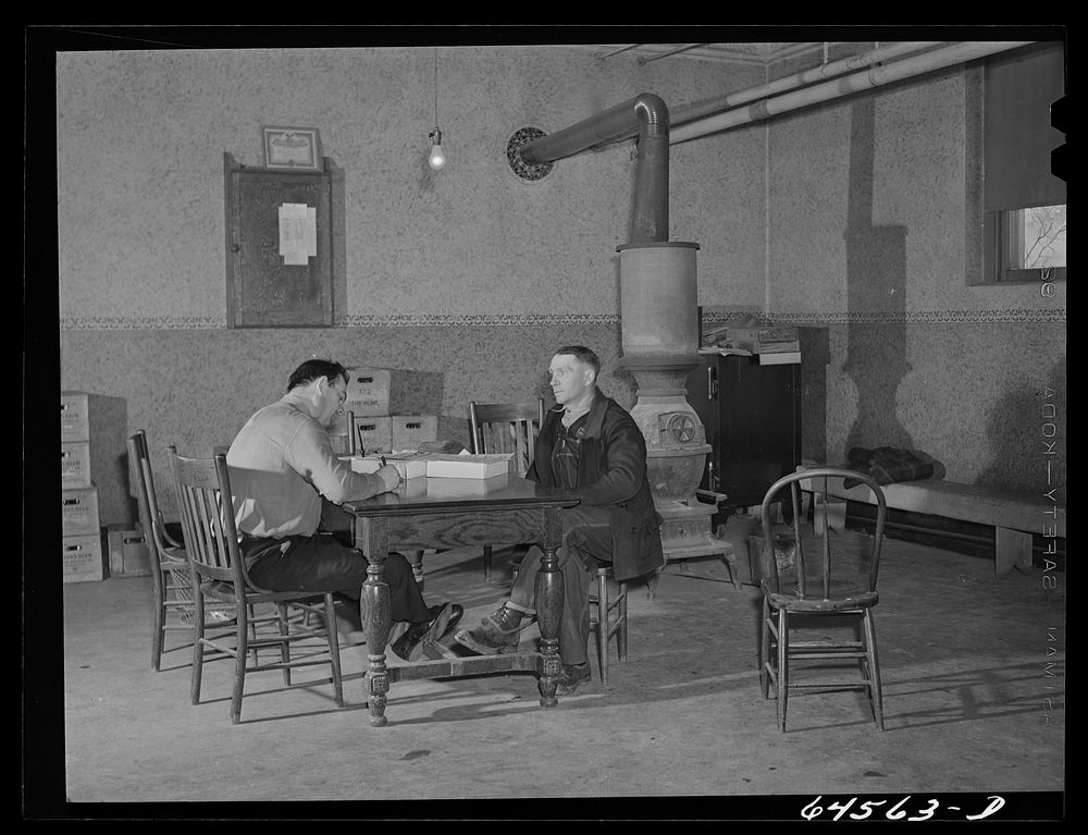Plato, Minnesota. Farmer registering for Selective Service. Sourced from the Library of Congress.