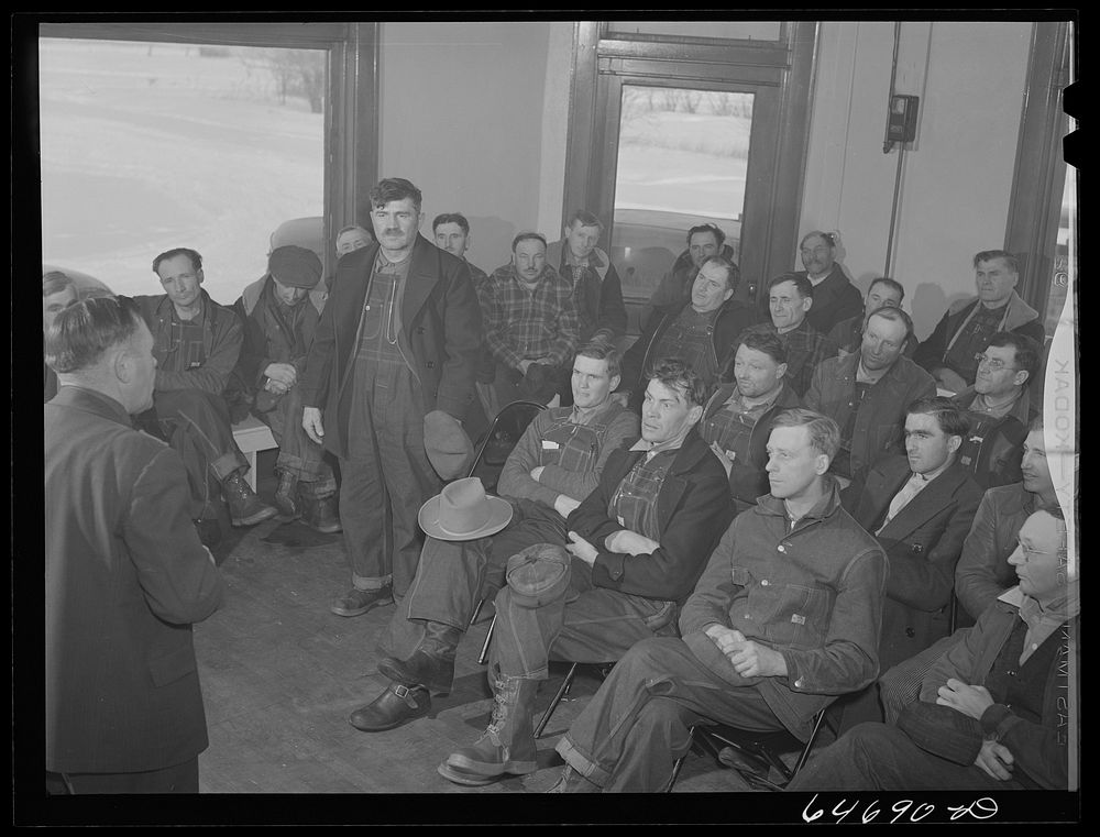 Gladstone, North Dakota. County agent addressing group of farmers at Food for Victory meeting. Sourced from the Library of…