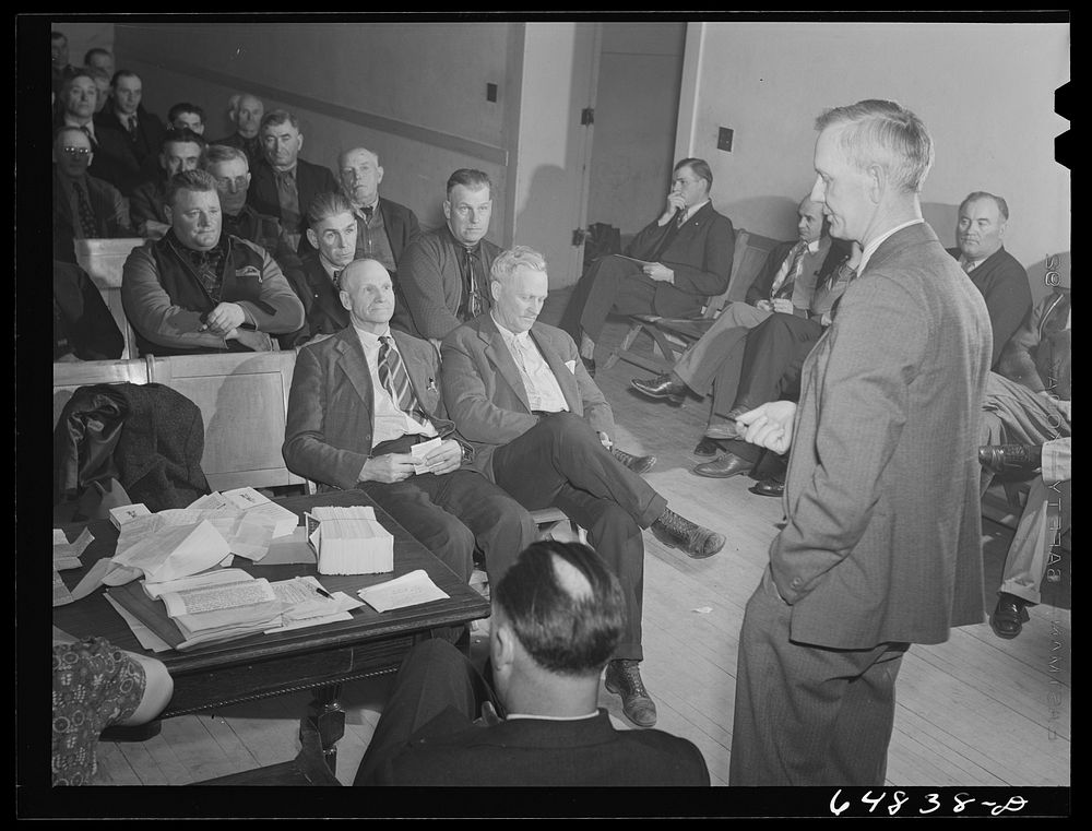 Williston, North Dakota. County commissioner addressing meeting of farmers' union to protest to the county commissioners the…