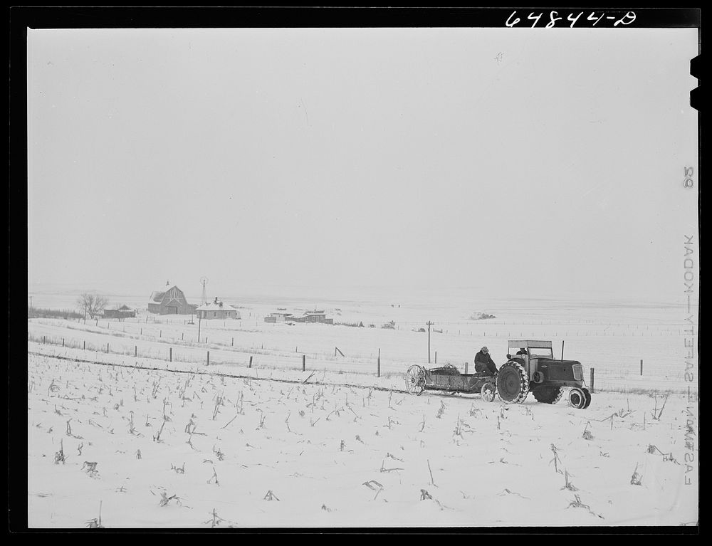 Adams County, North Dakota. Stock farmer, George P. Moeller, spreading manure on his cornfield. Sourced from the Library of…