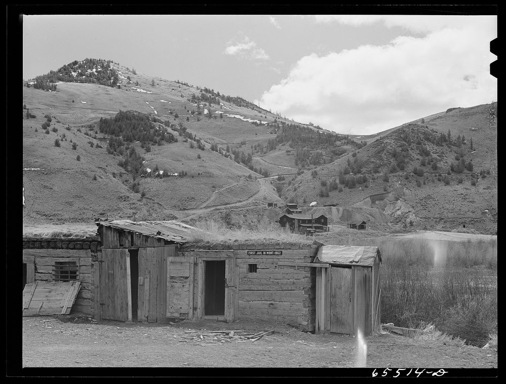 Bannack, Montana. First jail in Montana. Old mine workings in background. Sourced from the Library of Congress.