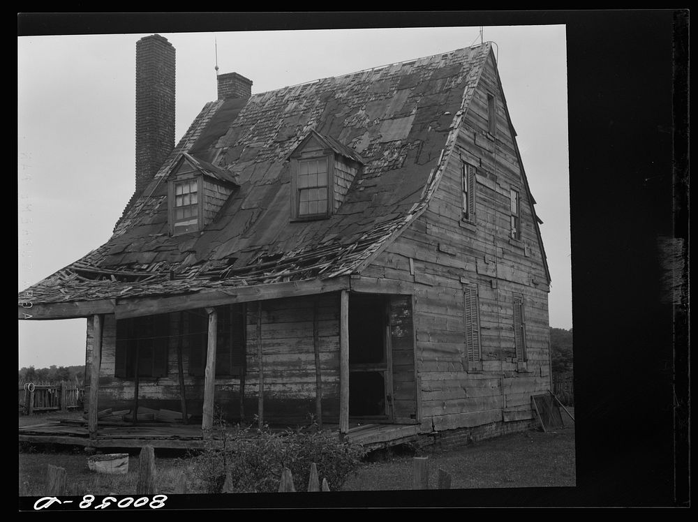 [Untitled photo, possibly related to: Plantation house built before the Civil War now owned and lived in by slave…