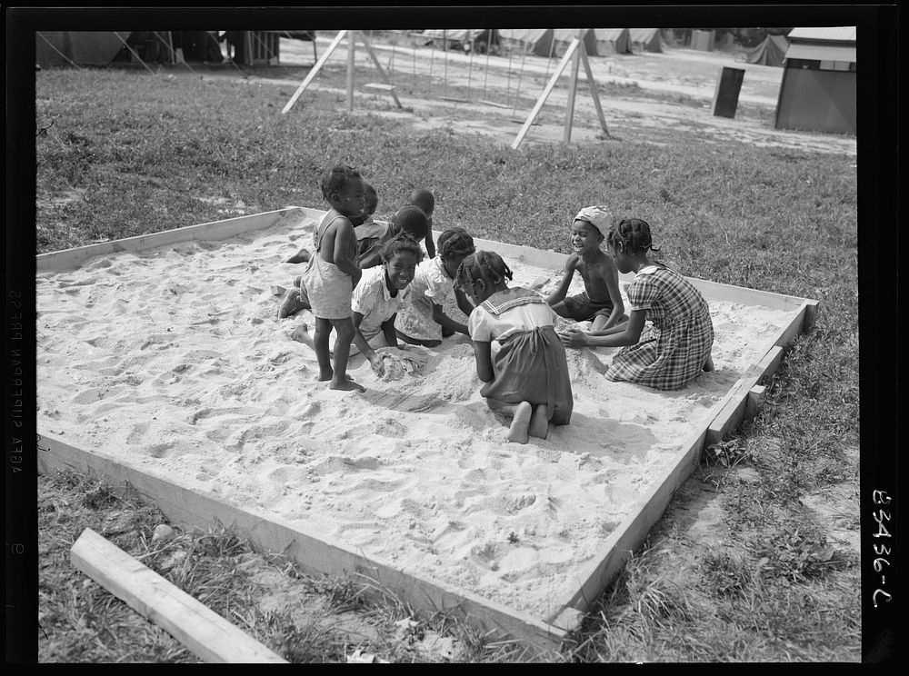 Bridgeton, New Jersey. FSA (Farm Security Administration) agricultural workers' camp. The children are discouraged from…