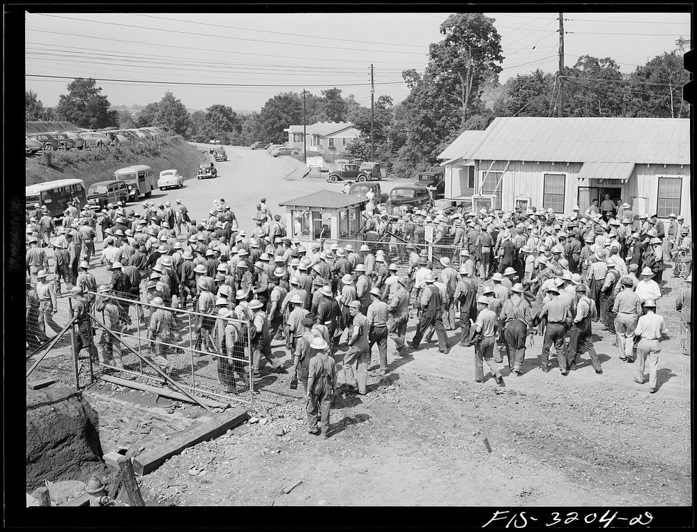 Fort Loudon [i.e., Loudoun] Dam, Tennessee. Tennessee Valley Authority (TVA). Workers leaving the job at change of shift.…