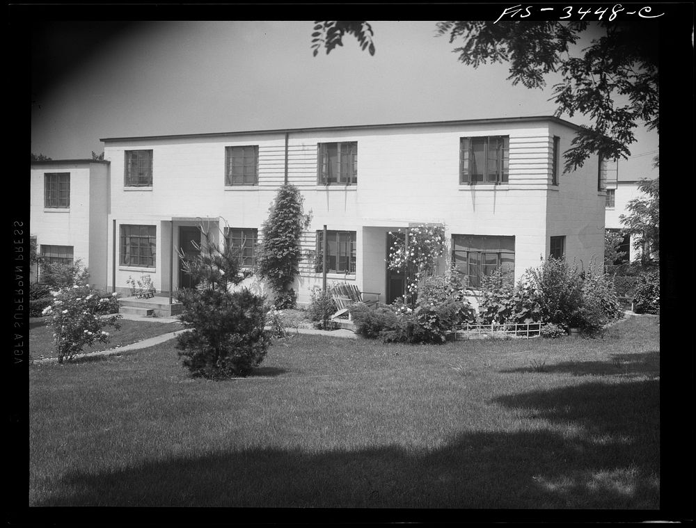 [Untitled photo, possibly related to: Greenbelt, Maryland. Federal housing project. Two flat-roofed houses from the front].…