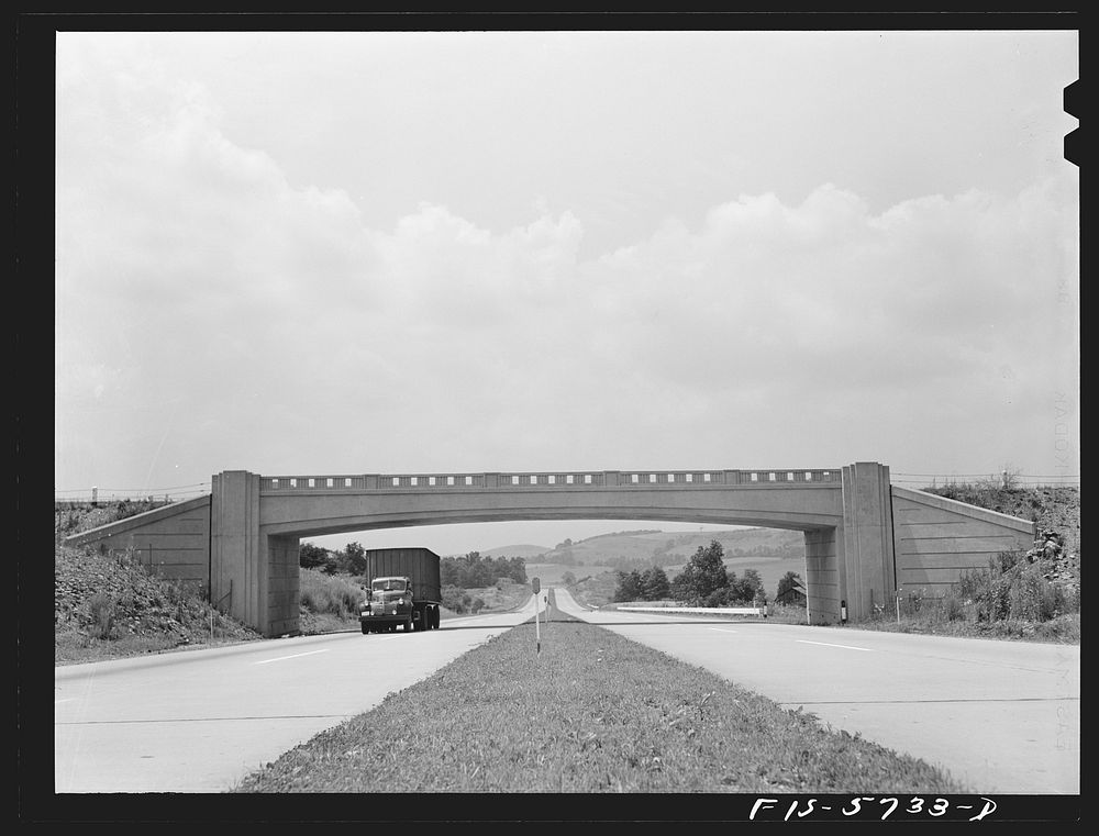 Pennsylvania Turnpike, Pennsylvania. Cross traffic is carried by overhead bridges. Sourced from the Library of Congress.