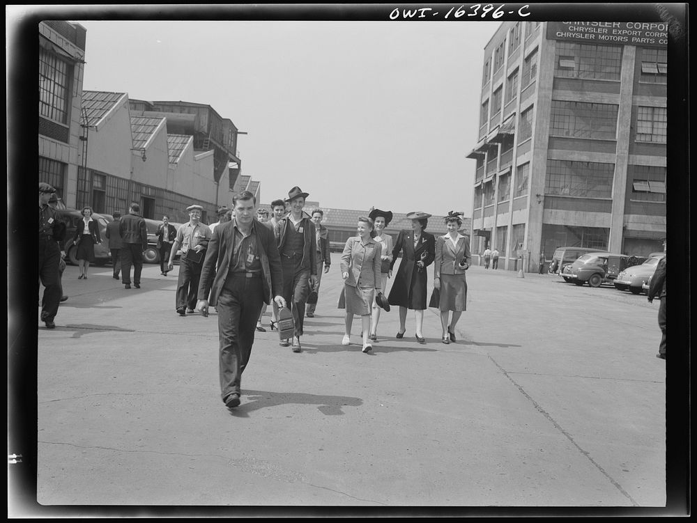 Detroit, Michigan. Men and women workers coming out of the Chrysler Corporation. Sourced from the Library of Congress.