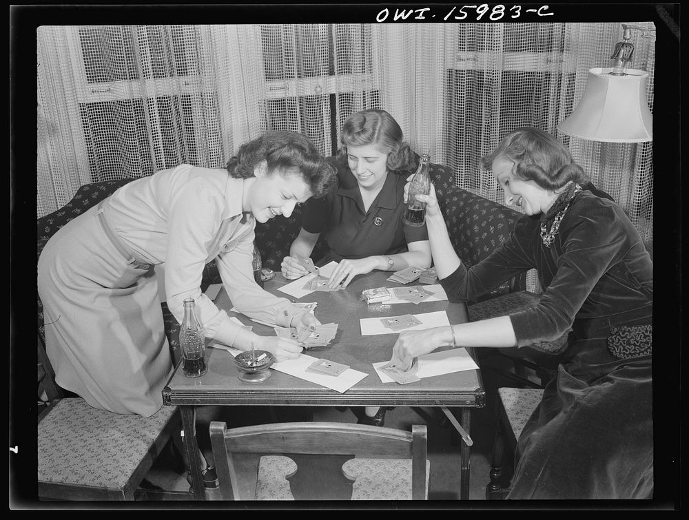 Detroit, Michigan. Girls playing cards and drinking coca cola. Sourced from the Library of Congress.