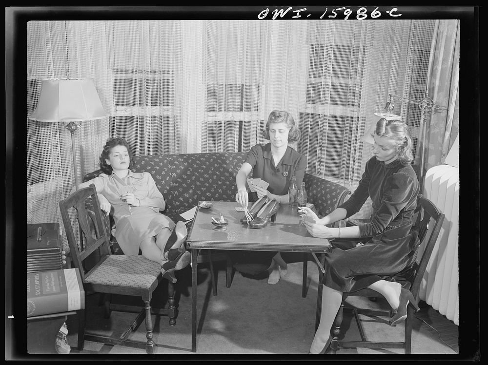 [Untitled photo, possibly related to: Detroit, Michigan. Girls playing cards and drinking coca cola]. Sourced from the…