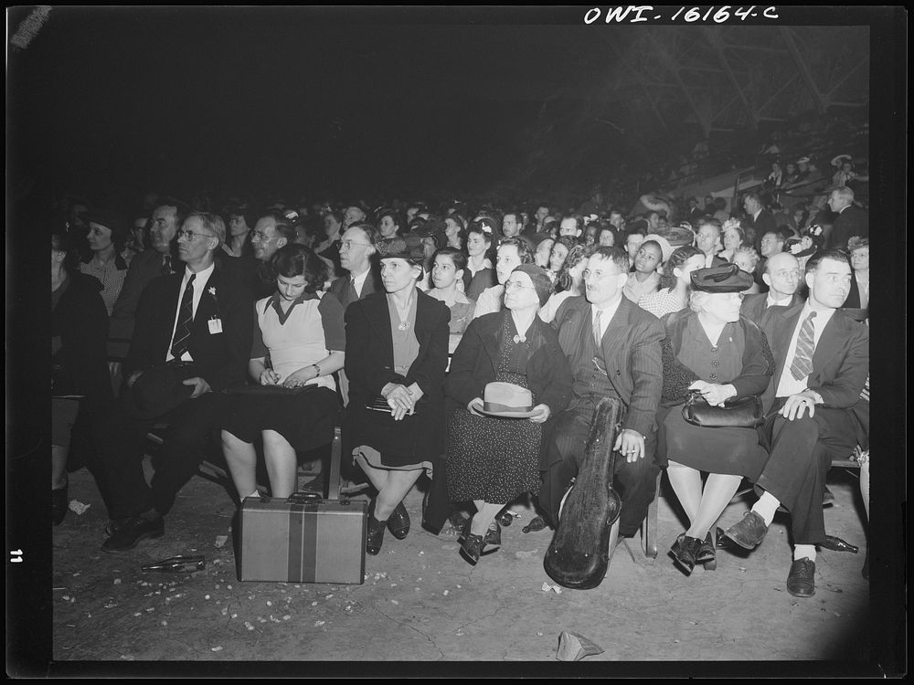 Detroit, Michigan. Audience at an entertainment at a scrap salvage rally sponsored by the Work Projects Administration (WPA)…
