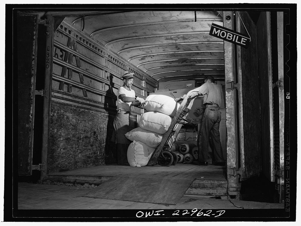 New Orleans, Louisiana. Loading a truck bound for Mobile at the Associated Transport Company. Sourced from the Library of…