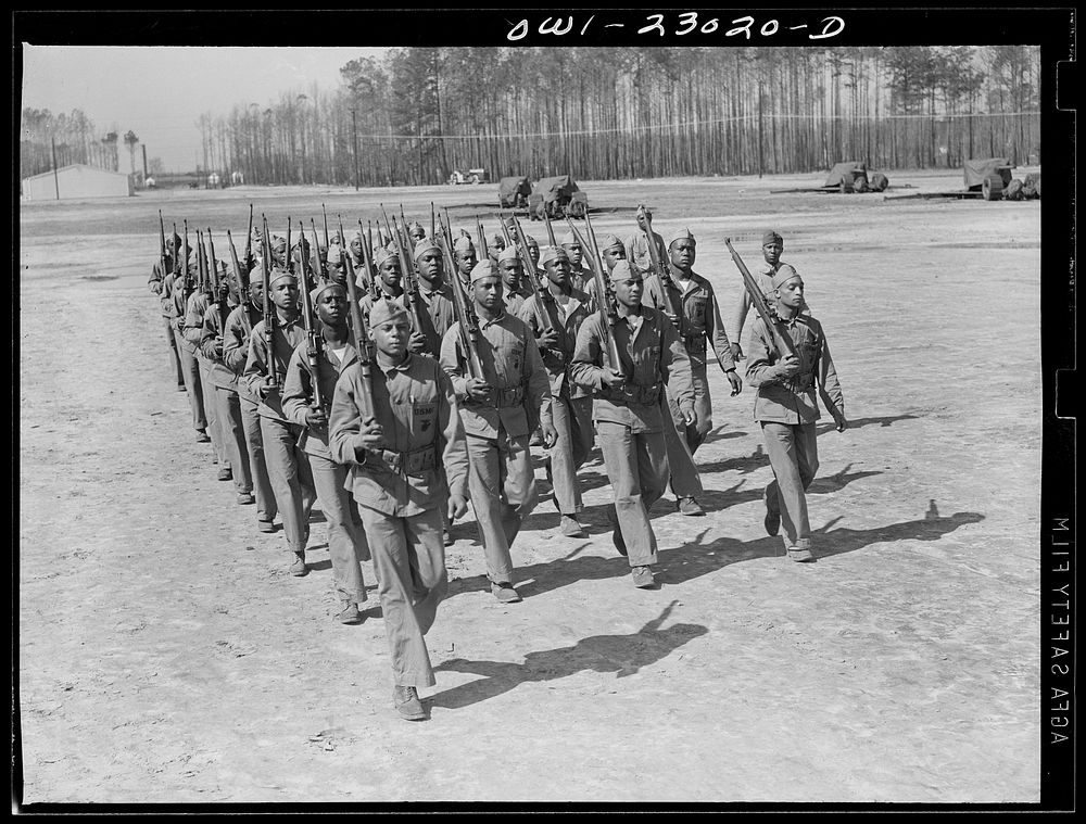 Camp Lejeune, New River, North Carolina. "Boots" (new recruits) learning to drill. Sourced from the Library of Congress.