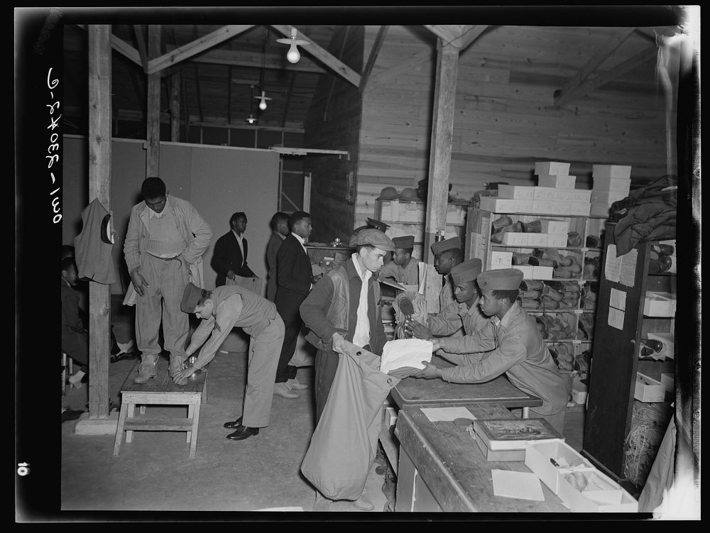 Camp Lejeune, New River, North Carolina. Scene at the Marine Corps camp's supply quarters. Sourced from the Library of…