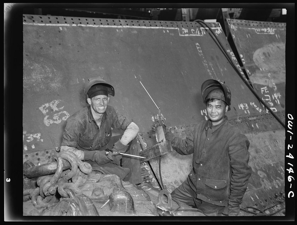 [Untitled photo, possibly related to: Baltimore, Maryland. Electric welders at work on the Liberty ship Frederick Douglass…