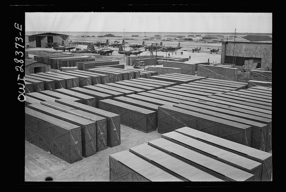 Crated fighter planes awaiting assembly at a delivery point of American warplanes to Russia somewhere in Iran. Sourced from…