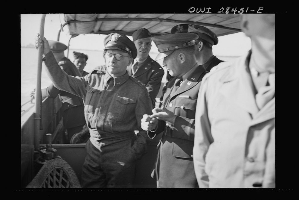 Major General Lewis Brererton inspecting port facilities somewhere in the Middle East. Handling ships bringing supplies for…