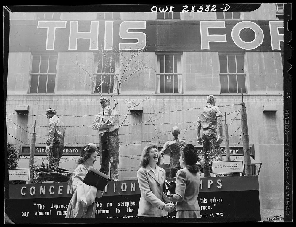 New York, New York. Spectators at the Nature of the Enemy show, put up by the United States OWI (Office of War Information)…