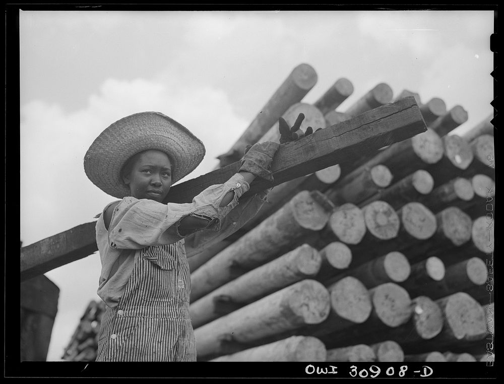 Beaumont, Texas. Woman worker at the International Creosoting plant. This work was formerly done by men. Sourced from the…