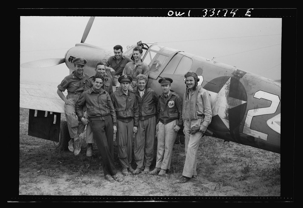 [Untitled photo, possibly related to: Members of the 64th Squadron of the 57th Fighter Group, which took part in the aerial…