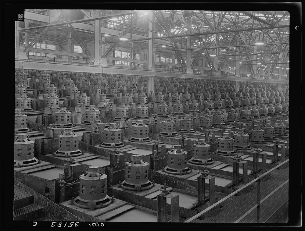 [Untitled photo, possibly related to: Flotation machines at one of the copper concentrators of the Utah Copper Company in…