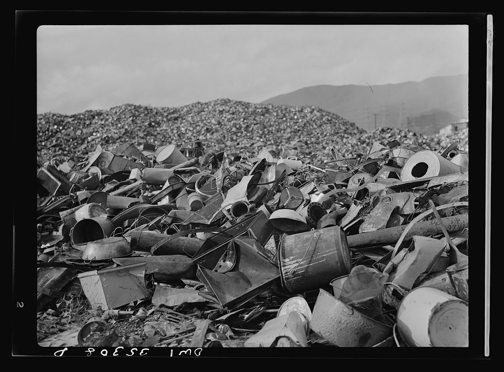 San Francisco, California. Pile of salvaged tin cans at the metal and thermite Company. In the foreground are cans of a type…