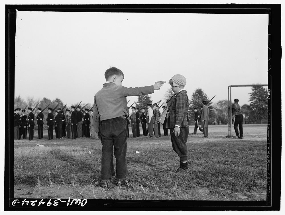 Washington, D.C. Small boys watching the Woodrow Wilson high school cadets. Sourced from the Library of Congress.