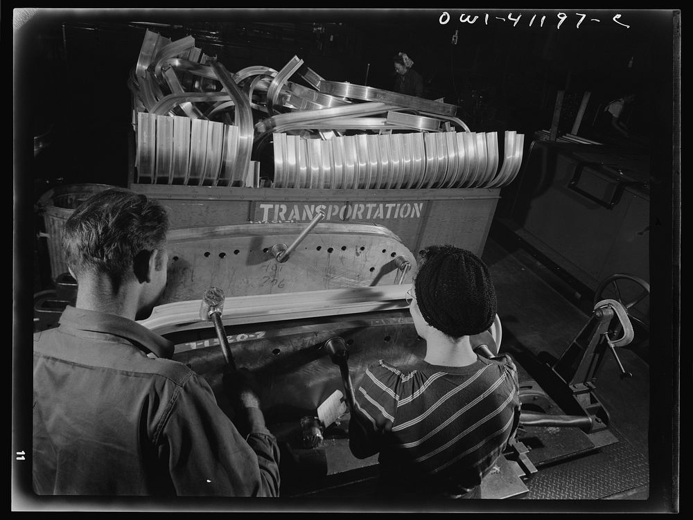Boeing aircraft plant, Seattle, Washington. Production of B-17 (Flying Fortress) bombing planes. Truck operators. Sourced…