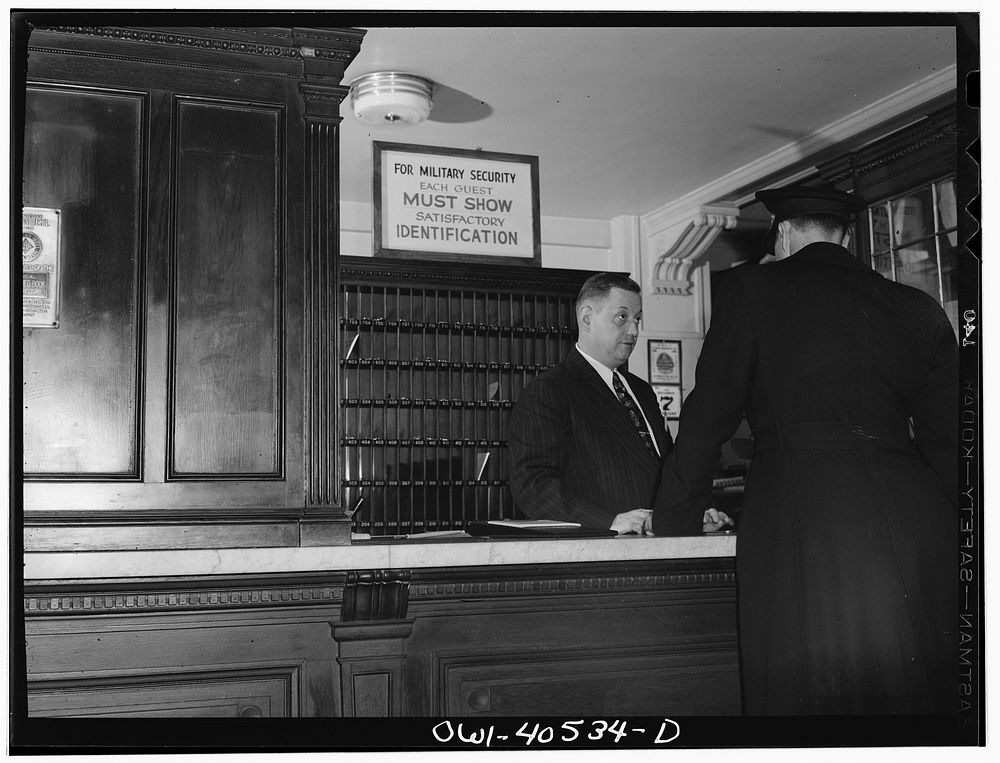 Washington, D.C. The reception desk at the United Nations service center, a hotel for servicemen. Sourced from the Library…