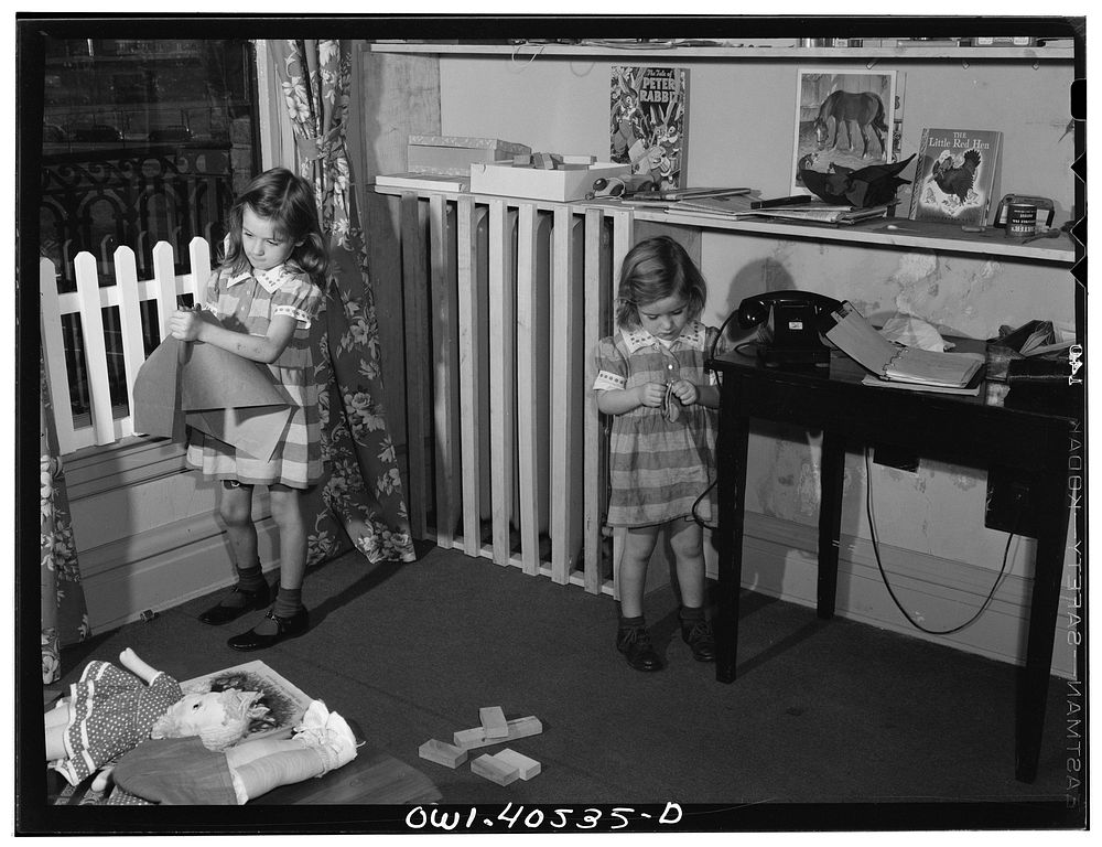 Washington, D.C. Children playing in the nursery at the United Nations service center while their mother makes arrangements…