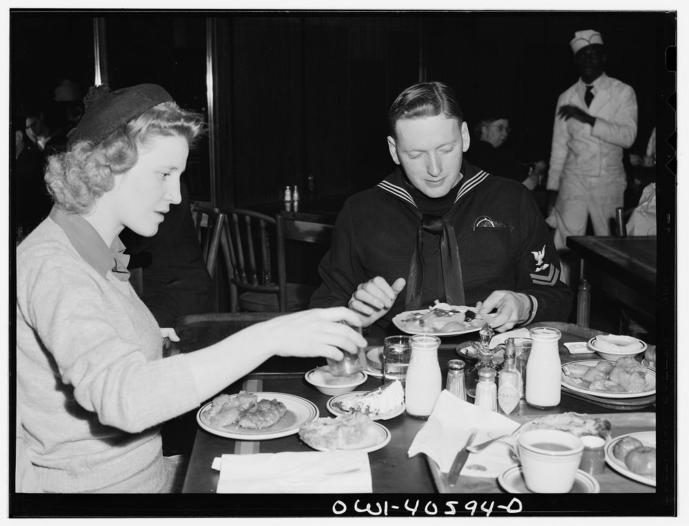 Washington, D.C. Hugh and Lynn Massman eating lunch at a cafeteria after a day of sightseeing. Their eight-weeks-old son is…