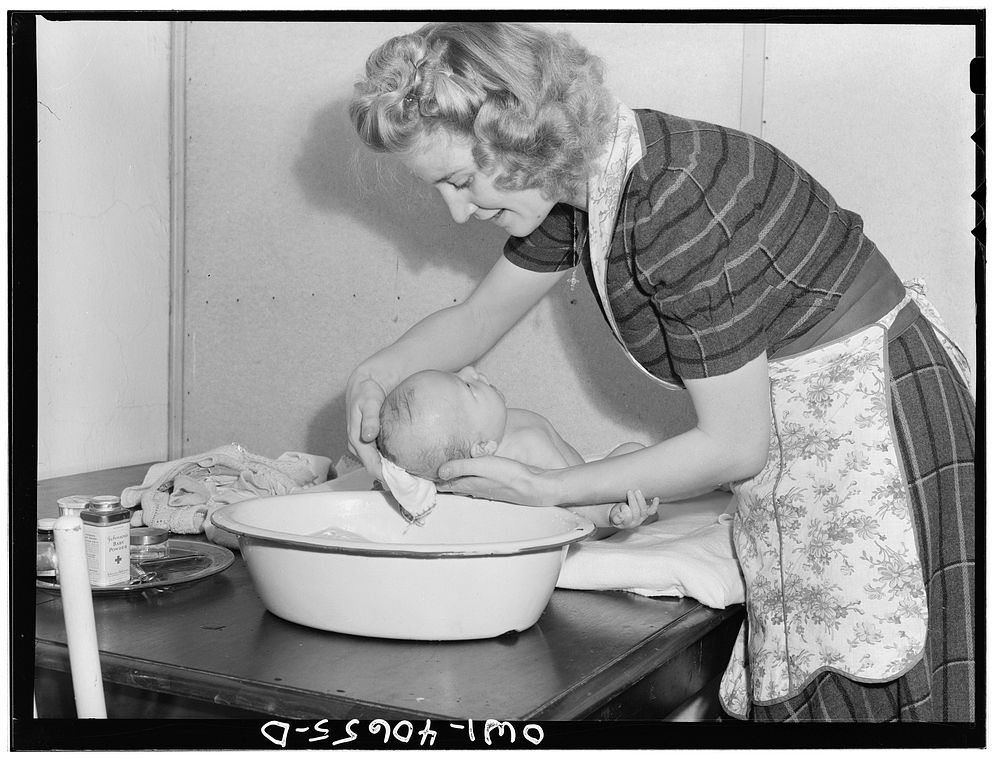 Washington, D.C. Lynn Massman, wife of a second class petty officer who is studying in Washington, D.C., giving eight weeks…