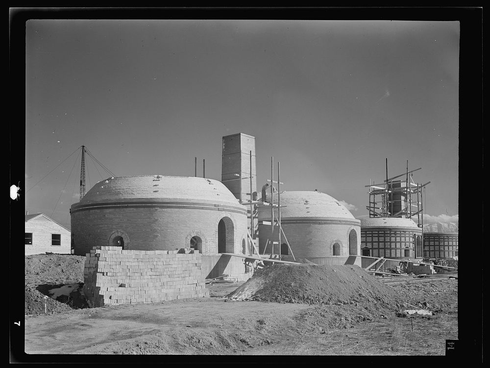 [Untitled photo, possibly related to: Columbia Steel Company at Geneva, Utah. Metal casings for concrete piles that will…