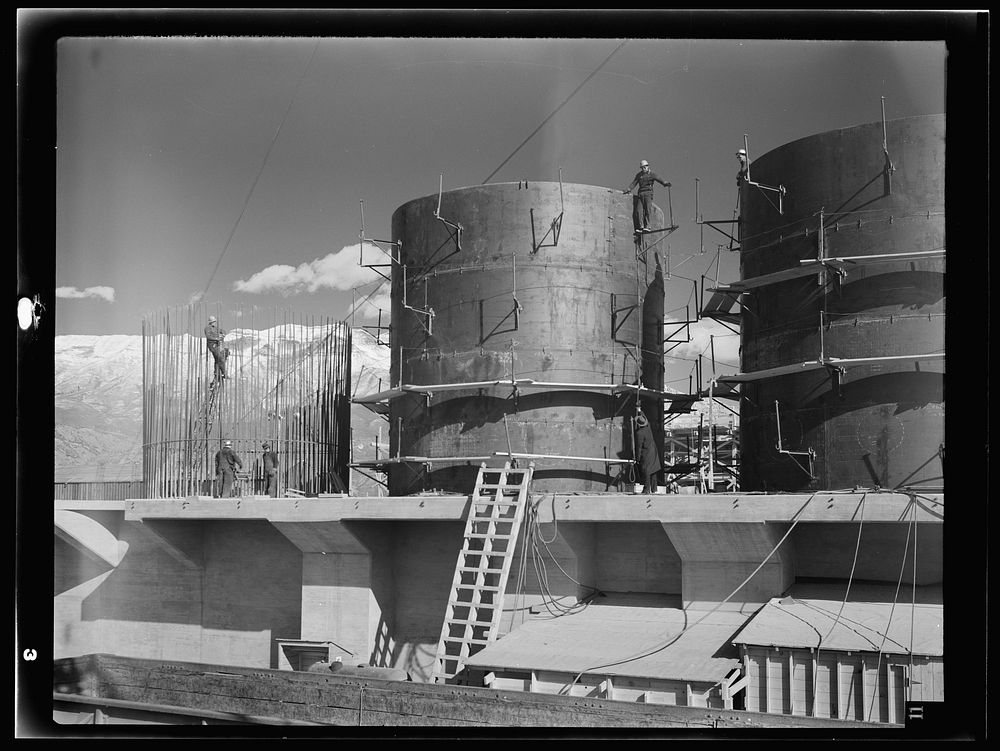 [Untitled photo, possibly related to: Columbia Steel Company at Geneva, Utah. The erecting crane is kept busy as blast…