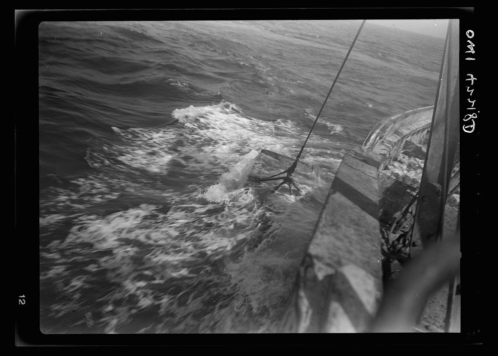 On board a fishing vessel out from Gloucester, Massachusetts. View of choppy waters. Sourced from the Library of Congress.