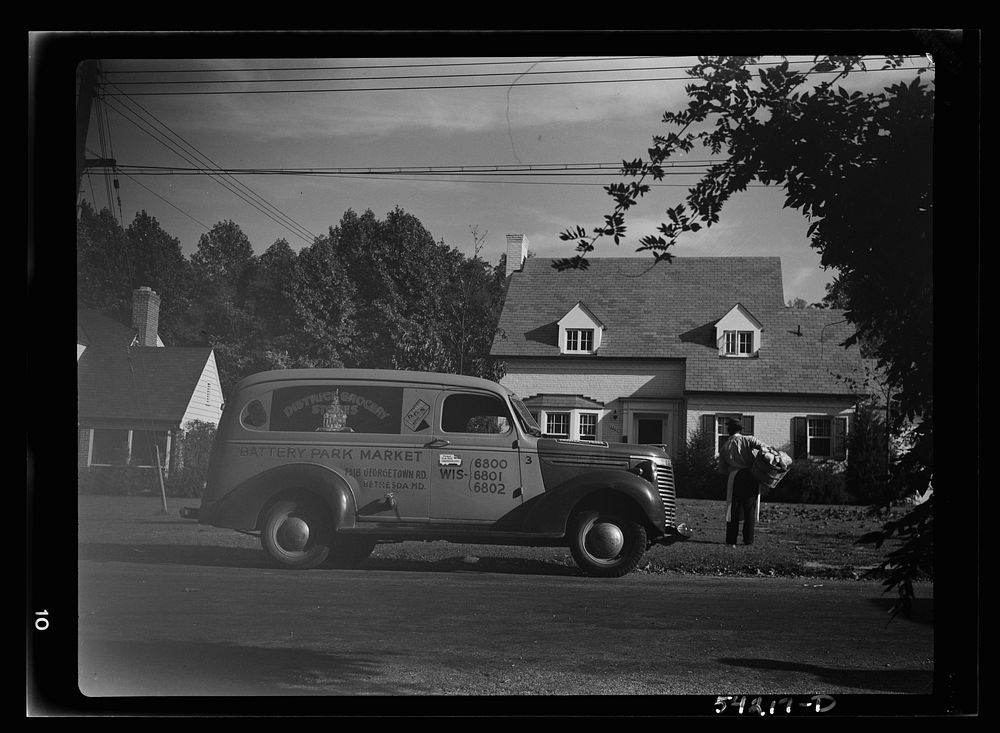 [Untitled photo, possibly related to: Bethesda, Maryland. A Battery Park Market truck on the door of which is displayed a…