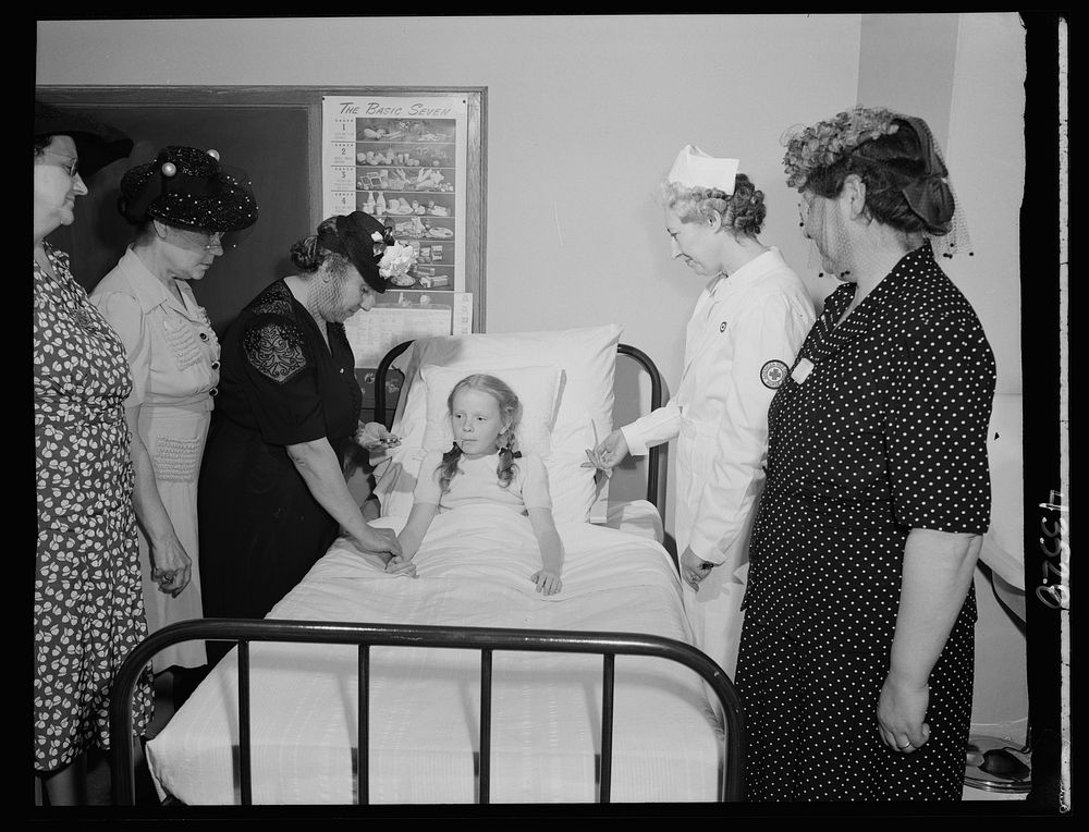 Brooklyn, New York. A home nursing class held at the community house of the Church of the Good Shepherd. Sourced from the…