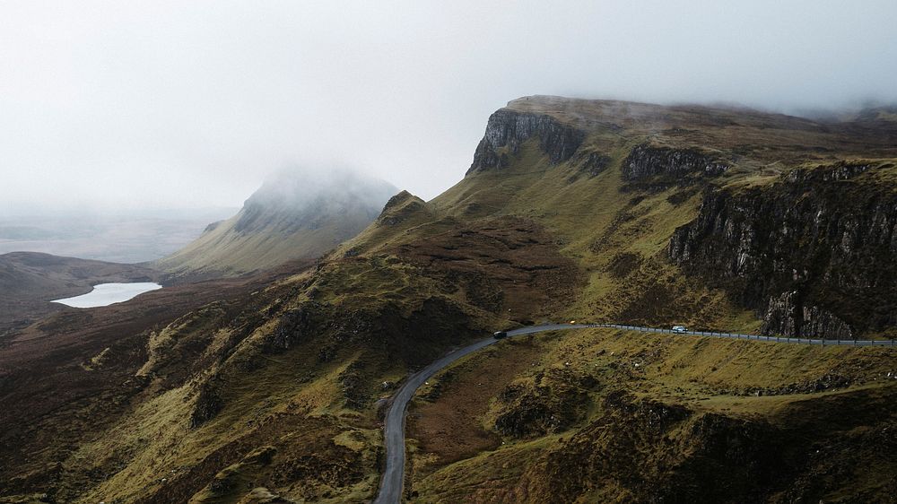 Mountain desktop wallpaper background, misty Quiraing on the Isle of Skye in Scotland
