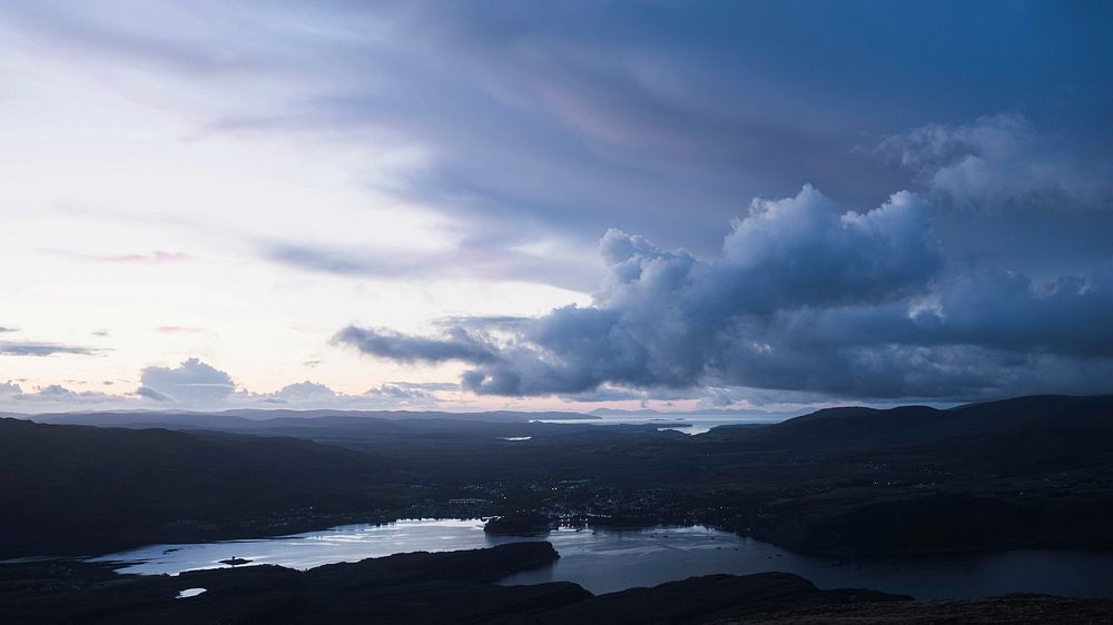 Nature desktop wallpaper background, cloudy sky over a city of Isle of Skye, Scotland