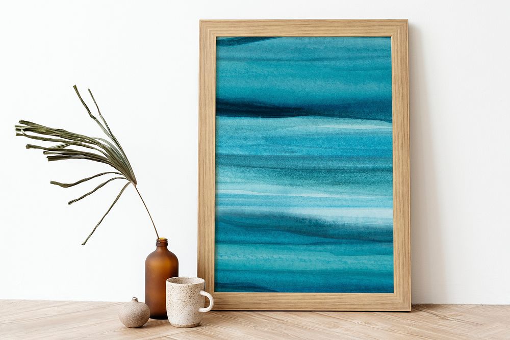 Ombre blue ocean picture frame on wooden floor