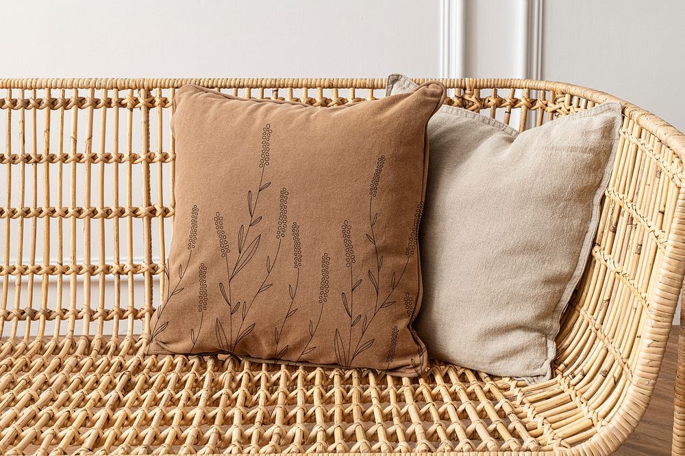 Floral brown printed cushion on a chair minimal interior design