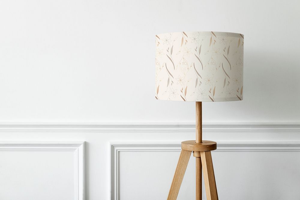 Floral patterned lamp on a white wall minimal interior design