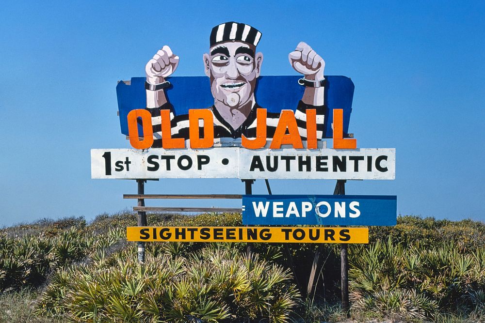 Old Jail billboard, Route A1A, St. Augustine, Florida (1979) photography in high resolution by John Margolies. Original from…